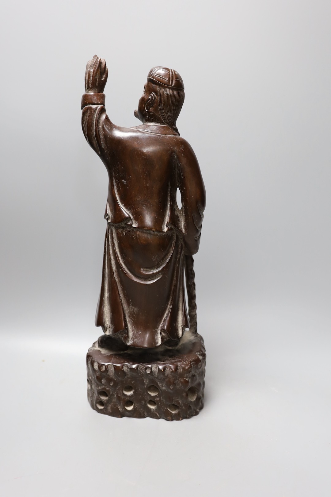 A Chinese carved hardwood figure of a sage 39.5cm